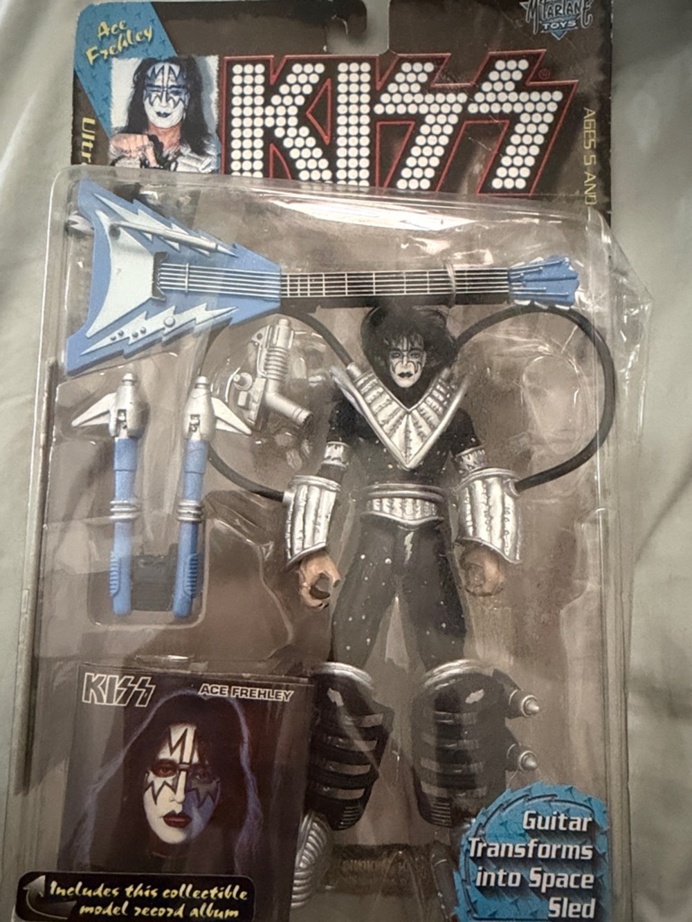 Vintage Kiss Ace Frehley Action Figure with Blue and Silver Guitar